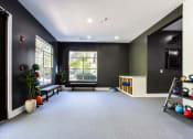 Thumbnail 16 of 49 - a yoga room with a large window and black walls  at Peaks at Gainesville, Gainesville, Georgia