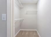 Thumbnail 44 of 49 - a spacious walk in closet in a white room with shelves  at Peaks at Gainesville, Gainesville, 30507