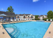 Thumbnail 3 of 27 - our apartments have a resort style pool with lounge chairs
