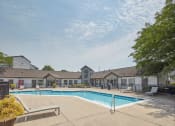 Thumbnail 8 of 14 - our apartments offer a swimming pool with our buildings in the background