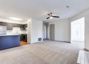 Thumbnail 29 of 52 - Carpeted Living Area at Riverwalk Vista, Columbia, SC