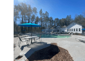 Thumbnail 14 of 52 - Poolside Dining Tables at Riverwalk Vista Apartment Homes by ICER, Columbia