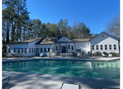 Thumbnail 12 of 52 - Pool With Clubhouse View at Riverwalk Vista Apartment Homes by ICER, Columbia, South Carolina