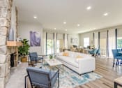 Thumbnail 1 of 20 - the estates at tanglewood|living room with stone fireplace at Summit East Ridge, East Ridge, 37412