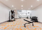 Thumbnail 11 of 46 - Club-Quality Fitness Center at The Carter 4250 Apartments, Norcross, GA