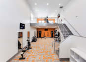 Thumbnail 8 of 46 - Two Level Fitness Center at The Carter 4250 Apartments, Norcross, Georgia