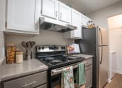 Thumbnail 12 of 21 - 2BR, 1BA – 1,100SF - Kitchen