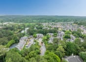 Thumbnail 2 of 21 - an aerial view of a neighborhood with houses and trees