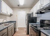 Thumbnail 18 of 21 - 1BR, 1BA – 851SF - Kitchen