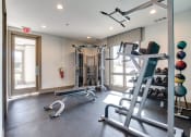 Thumbnail 26 of 29 - Two Level Fitness Center at The Metro Apartments, Atlanta, GA, 30339