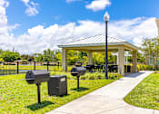 Thumbnail 27 of 34 - a picnic area with a pavilion and mailboxes on the grass at Ventura at Turtle Creek, Rockledge, Florida