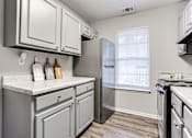 Thumbnail 17 of 60 - Kitchen Cabinets at Wildcreek Apartments, Georgia