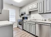 Thumbnail 16 of 60 - Furnished Kitchen at Wildcreek Apartments, Georgia 30021