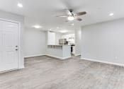 Thumbnail 3 of 26 - an open kitchen and living room at Wood Terrace, Doraville, 30340