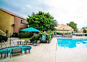 Thumbnail 15 of 18 - our apartments offer a swimming pool with tables and umbrellas