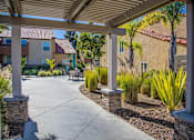 Thumbnail 4 of 18 - an outdoor patio area at the preserve at tampa palms apartments in tampa