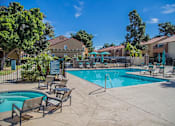 Thumbnail 12 of 18 - our apartments have a swimming pool with chairs and umbrellas