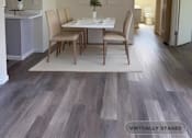Thumbnail 26 of 26 - A dining room with a table and chairs.