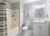 Thumbnail 14 of 15 - a bathroom with a bathtub toilet and sink