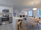 Thumbnail 1 of 8 - a kitchen and living room