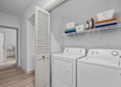 Thumbnail 16 of 30 - laundry room with stand alone washer and dryer at The Aster Sugar Land, Sugar Land
