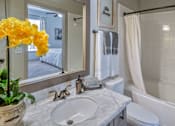 Thumbnail 15 of 30 - Bathroom With Bathtub at The Aster Sugar Land Apartments, Sugar Land, Texas