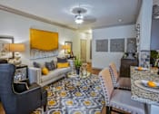 Thumbnail 10 of 30 - Living Room With Kitchen View at The Aster Sugar Land Apartments, Sugar Land, Texasar Land