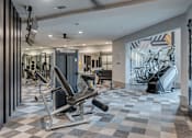 Thumbnail 19 of 28 - Gym with a variety of equipment including a rowing machine at Caldwell, Texas, 77084