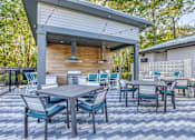 Thumbnail 18 of 38 - Outdoor Patio with tables and chairs at The Beck at Hidden River, Tampa, FL, Florida , 33637