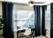 Thumbnail 11 of 40 - Large windows in living room located at Addison on Cobblestone located in Fayetteville, GA 30215