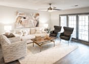 Thumbnail 4 of 22 - Living Room with a White Couch at The Addison at Collierville Apartments, Collierville