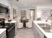 Thumbnail 2 of 22 - Modern Kitchen at The Addison at Collierville Apartments, Collierville, Tennessee