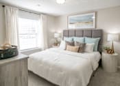 Thumbnail 6 of 22 - Bedroom with a Large Bed at The Addison at Collierville Apartments, Collierville, TN