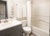 Thumbnail 9 of 22 - White Bathroom at The Addison at Collierville Apartments, Collierville, Tennessee