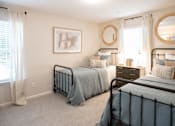 Thumbnail 8 of 22 - Bedroom with Two Beds at The Addison at Collierville Apartments, Tennessee