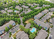 Thumbnail 42 of 42 - Aerial view of apartment community with pool and parking at Alden Place at South Square Apartments, Durham, North Carolina