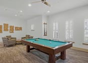 Thumbnail 36 of 42 - Game room with billiards table and seating area at Alden Place at South Square Apartments, North Carolina, 27707