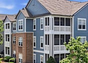 Thumbnail 40 of 42 - Three story apartment buildings with screened porches at Alden Place at South Square Apartments, North Carolina, 27707