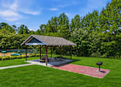 Thumbnail 27 of 42 - Covered picnic pavilion with grills and tables at Alden Place at South Square Apartments, North Carolina, 27707