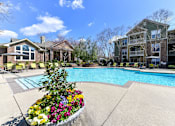 Thumbnail 29 of 41 - Enjoy one of our two sparkling swimming pools with more than enough lounge chairs to relax at Alden Place at South Square Apartments, Durham, NC 27707