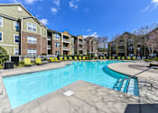 Thumbnail 1 of 41 - Enjoy one of our two sparkling swimming pools with more than enough lounge chairs to relax and catch some rays at Alden Place at South Square Apartments, Durham, NC 27707