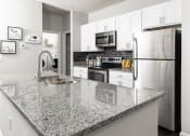 Thumbnail 1 of 40 - Granite Countertop Kitchen at Ansley Town Center, Evans, 30809