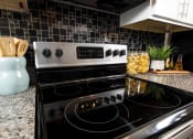 Thumbnail 3 of 40 - Model glass top stove at Ansley at Town Center in Evans GA