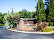 Thumbnail 11 of 30 - The entrance to Anny Robert's Lake is marked by a brown sign.