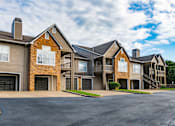 Thumbnail 25 of 30 - the view of two story apartment buildings with balconies and garages at Appling Lakes, Cordova, TN, 38016