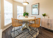 Thumbnail 4 of 18 - Renovated Dining Room with Wood Style Flooring Image at Arbors Harbor Town, Memphis, TN