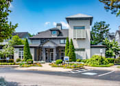 Thumbnail 8 of 18 - a picture of the front of a house with a parking lot in front of it at Arbors Harbor Town, Tennessee, 38103