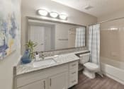 Thumbnail 7 of 18 - a bathroom with a toilet sink and bathtub at Arbors Harbor Town, Memphis, Tennessee