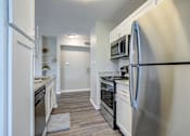 Thumbnail 2 of 18 - Renovated Kitchen with Stainless Steel at Arbors Harbor Town, Tennessee, 38103