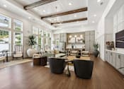 Thumbnail 17 of 18 - A spacious living room with a high ceiling and wooden floors. at Arcadia Cartersville Apartments, Cartersville, GA, 30121